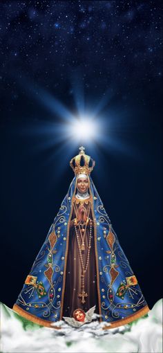 an image of the virgin mary in blue and gold dress with stars above her head