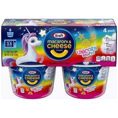 three yogurt cups with unicorn and stars on them in front of a box