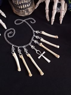 Here is a Lovely Egyptian Coyote Bone Necklace. It was Made with 6 Real Coyote Bones, With 7 Skull Charms, And One Ankh Pendant It is Adjustable up to 20 inches. All Items Ship Within 1-3 Days via USPS First Class Service. Shipping on This Bone Necklace is 6.00 International Shipping Will Be 20.00 Additional Items add 1.00 to the Cost. International Shipping May Take 2 - 4 Weeks To Deliver. All The Bones Here are Legal To Buy, Sell, And Own In The United States We are Happy To answer Any Questions You may have, Including any Questions About Custom Orders. I Should Get Back To You Within 24 hours. Wiccan Earrings, Ankh Pendant, Wiccan Necklace, Egyptian Necklace, Ankh Necklace, Fish Hook Necklace