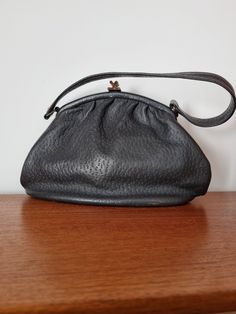 Description:  Vintage Grey Freedex Kelly Handbag. Made in England. 'A Freedom Model', Lined, Leather.Measurements:Height: 16cm, Width: 27cm, Bag to Strap: 14cm Vintage Appreciation Society: Online and Instore @vintageappreciationsociety and @handbagappreciationsociety Vintage Leather Evening Bag For Daily Use, Vintage Leather Evening Bag For Everyday Use, Vintage Pouch Shoulder Bag For Formal Occasions, Vintage Evening Bag With Removable Pouch For Daily Use, Vintage Evening Bag With Detachable Strap For Travel, Vintage Handheld Evening Bag With Detachable Strap, Vintage Satchel With Removable Pouch For Formal Use, Vintage Handheld Satchel With Removable Pouch, Vintage Satchel With Detachable Strap