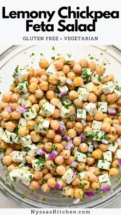 a glass bowl filled with chickpea salad