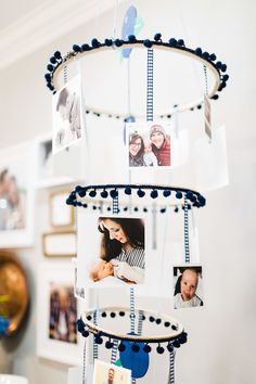 a cake with pictures hanging from it's sides