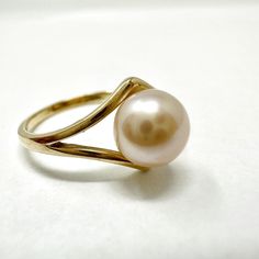 14K Gold Ring with Freshwater Pearl Designer = Jewelry Size = 5.5 Material = 14K Gold Gemstone = Freshwater Pearl Condition = Good Location: Wilmette Item Number: 101-2159 Item ID: 288303 Category: Ring Pearl Ring Simple, Silver Pooja Items, Pooja Items, Gold Pearl Ring, Pearl Jewelry Design, Wedding Party Ideas, Ring Simple, 14k Gold Ring