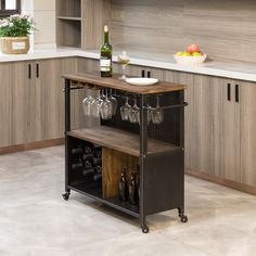 a kitchen island with wine glasses on it