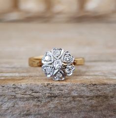 a close up of a ring on a wooden surface