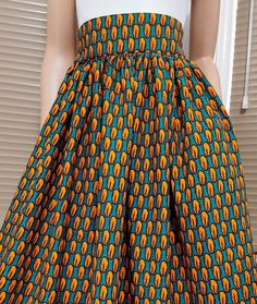 Handmade Unlined African Print Midi Skirt     Elastic waist band skirt at the back      2 open side-entry pockets     Exact length: 30" / 76cm     100% Wax Cotton     Handmade     Made in the UK (Colours may vary due to lighting on images. The product images are closest to the true colour of the product.) African Print Midi Skirt, Mid Calf Skirt, Chic Dress Classy, Handmade Uk, Printed Midi Skirt, Dress Classy, Samara, Womens Skirts, Waxed Cotton