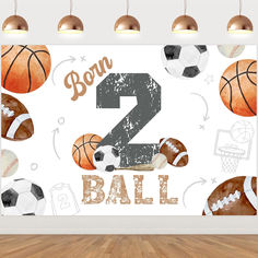 a sports themed birthday backdrop with basketballs, balls and the number two on it