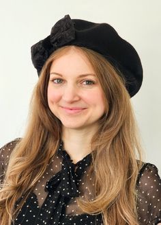 Practical and warm with a unique vintage vibe! Lovely very high quality Czech 100% wool beret.  Deep black color. (my photos do not due justice to this beret, it is som much better in person!) I decorated it with three vintage ribbons. Floral embroidered ribbon is from my travels in India. The black grosgrain  and velvet are both from France. One size fits all but beret has give and can stretch to fit most head sizes. It can be steamed and shaped larger if necessary. Beret circumference is the s Black Wool Beret For Fall, Black Wool Beret Cap, Retro Black Beret For Winter, Black Bonnet Cap For Fall, Winter Wool Beret, Black Fall Bonnet Cap, Black Winter Felt Hat, Black Wool Beret, Black Fitted Beret For Fall