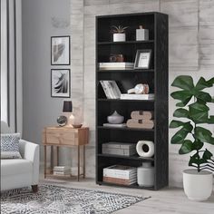 a living room with a couch, chair and bookshelf