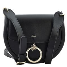 Chloe Ladies Crossbody. SKU: CHC23AS141J38-BLACK. Barcode: 7614027046885. Color: Black. Chloe Ladies Black Arlene Leather Crossbody Bag. Crafted from calf leather, this bag features a foldover top with magnetic fastening, a spacious interior with internal zip-fastening pocket, adjustable detachable shoulder strap, ring hardware detailing and finished with a logo stamp to the front. Made in Italy. Versace Watch, Cheap Gifts, Denim Shoes, Crossbody Messenger Bag, Black Crossbody, Logo Stamp, Black Handbags, Handbag Backpack, Fashion Sunglasses