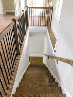 an empty staircase leading up to the second floor