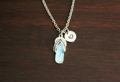 This necklace comes with a blue flip flop sandal charm, choice of an initial, bead or stamped heart and a chain of your choice.   Please leave in checkout notes: -Initial (If chosen option) -Bead # (If chosen option) -Length of chain: 18", 20", 22" or 24" Please choose chain from drop down box. C3-Stainless Steel 3mmx2.5mm Cable Chain-Small Link (Common Size) C4-Stainless Steel Ball Chain-Common C5-Stainless Steel Ball Chain-Fancy **I love creating custom orders. Please contact me if there is something you like and want it changed in any way to better suit you. Also, if there is something you have seen somewhere else and can describe it or send me a photo, I may be able to create it for you. It's worth a try! Just contact me and we can discuss it! **Check the FAQs section in the listing fo Lover Necklace, Jewelry Ocean, Blue Flip Flops, Lovers Necklace, Beach Gifts, Beach Lover, Summer Necklace, Sea Beach, Hand Wrap