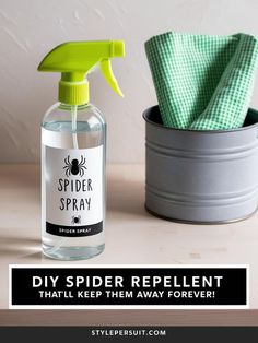 a bottle of spider repellent next to a potted plant with a green cloth