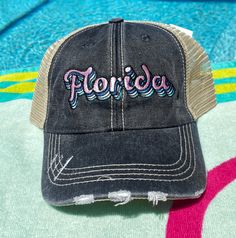 a black hat with the word florida written on it Distressed Trucker Hat With Curved Brim For Summer, Distressed Snapback Baseball Cap For Spring, Distressed Curved Brim Trucker Hat For Summer, Spring Distressed Snapback Baseball Cap, Black Distressed Snapback Trucker Hat, Distressed Trucker Hat With Curved Brim, Distressed Snapback Trucker Hat For Spring, Adjustable Distressed Trucker Hat Baseball Cap, Adjustable Distressed Trucker Baseball Cap