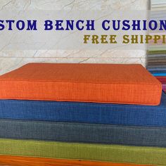 a stack of cushions with the words custom bench cushions free shipping