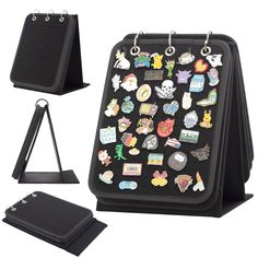 an assortment of pins and magnets on a black case with stand for display cards