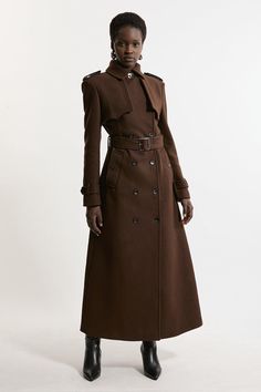 Feel Elevated No Matter The Weather In Our Midaxi Length Coat, Made In High Quality, Thick Italian Wool, Featuring A Fit That Flatters The Figure And A Dramatic, Long Length. The Double Breasted Buttons And Collared Neckline Make For A Classic, Traditional Piece That Maintains A Heightened Level Of Formality. Wear It Over Any Outfit, Whether Heading Out For Dinner Or To The Office. Italian Wool Tailored Belted Trench Coat High Quality Italian Wool Fabric Flattering Fitted Bodice Straight Hanging Trench Coat Outfit Italy, Trench Coat With Dress, High Collar Coat, Fancy Suits, Wool Dresses, Bride Jumpsuit, Petite Wedding Guest Dresses, Pirate Girl, Summer Teacher Outfits