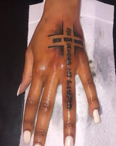 a woman's hand with a cross on it and the words how do you want to know?