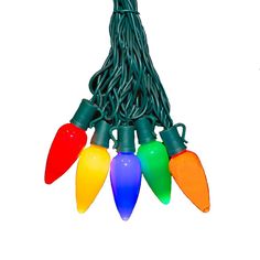 multi - colored christmas lights with green wire on white background