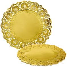 two yellow doily plates sitting next to each other