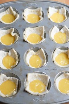 an image of eggs being cooked in muffin tins