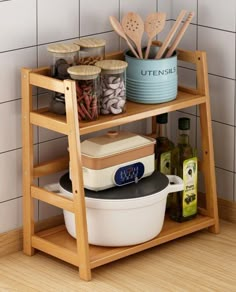 a wooden shelf with bowls and utensils on it next to a tiled wall