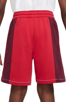 Comfort and style balance out in these kid-approved cotton-blend shorts fashioned with a drawstring waist and stand-out logo stitching. 80% cotton, 20% polyester Machine wash, tumble dry Imported Red Cotton Activewear For Loungewear, Cotton Sportswear Shorts For Playwear, Red Cotton Sporty Bottoms, Nike Cotton Activewear With Elastic Waistband, Nike Cotton Activewear With Built-in Shorts, Nike Cotton Activewear With Relaxed Fit, Sports Cotton Shorts With Ribbed Waistband, Casual Gym Shorts With Color Block, Casual Color Block Gym Shorts