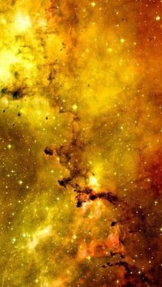 an image of some very pretty stars in the sky with yellow and red colors on it