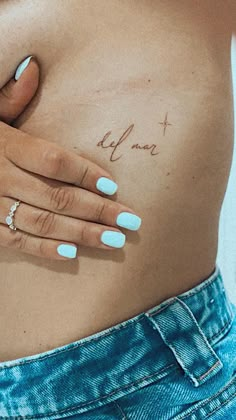 a woman's stomach with the word love written on it