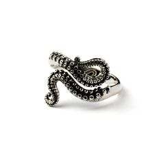 Take a deep breath and dive into the ocean to find the mystery of the octopus with this finely detailed tentacle adjustable ring that will beautifully wrap around your finger. An edgy unique gift to a special someone.  Material: 925 Sterling silver Dimensions: 15mm by 20mm by 3mm Size: Adjustable Click here to see the matching earrings: https://www.etsy.com/uk/listing/995093596/sterling-silver-octopus-earrings?ref=shop_home_active_1&pro=1 Bracelet: https://www.etsy.com/uk/listing/1089856723/ster Tentacles Ring, Octopus Earrings, Octopus Jewelry, Octopus Ring, Fake Gauge Earrings, Octopus Tentacles, The Octopus, Snake Jewelry, Packing Jewelry