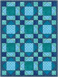 a blue and green quilt with squares on it