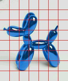 a blue balloon dog sitting on top of a grid