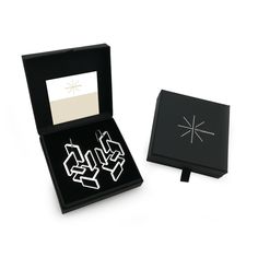 "Inspired by Theo Van doesburg architectural plan, these statement earrings with a three-dimensional perspective effect, very graphic and elegant are one of our most emblematic creation. ♥ Comes in a pretty box with the brand logo M A T E R I A L S Silver model ⚬ Attach : 925 Sterling silver ⚬ Pendant: silver plated brass Gold model ⚬ Attach : 925 Sterling silver gilded with 24 K fine gold ⚬ Pendant:  Gold plated brass with 24 K fine gold ⚬ Smooth and shiny surface ⚬ Nickel free ⚬ Stoppers : silicone backs ⚬ Sold by the pair D I M E N S I O N S ⚬ Pendant length: 6 cm / 2,4\" ⚬ Pendant width: 3 cm / 1,2\" ⚬ Weight: 2,6 grams a piece Original creation by Octagramme Designed and handcrafted with care in our workshop. If you have any questions, please send us a message and we'll be happy to he Architectural Earrings, 3d Perspective, Architectural Plan, Theo Van Doesburg, Crystal Spikes, Logo M, Silver Model, Long Chain Earrings, Mixed Metal Earrings