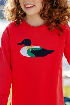 (model-text: Model Stats: Age 7 Red Tops For Fall Playtime, Red Winter Playwear Tops, Duck Applique, Comfy Crewneck, Barn Animals, Bay Boats, Nautical Flags, Pink Gingham, Dear Santa