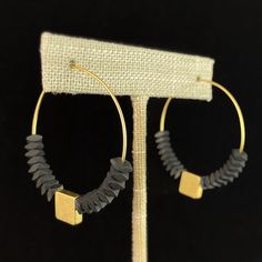 In styles ranging from sophisticated to whimsical, David Aubrey pieces are timeless--a bold statement for the moment as well as ten years from now. Each piece is a work of art in its own right. These hoops are approximately 1.5 inches in diameter. KMLE16 Beaded Hoop Earrings, Beaded Hoops, Jewelry Earrings Hoops, Gold Beads, Black And Gold, Hoop Earrings, Jewelry Earrings, Brass, Electronic Products