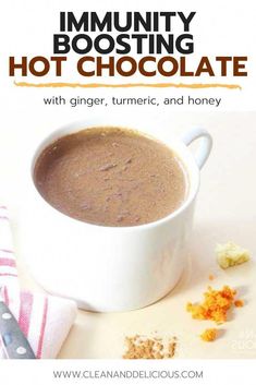 a close up of a cup of hot chocolate on a table with the title text above it