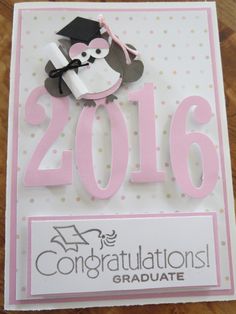 a graduation card with a monkey on the front and congratulations written in pink, black and white