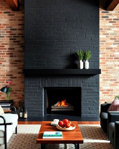 a living room filled with furniture and a fire place next to a brick wall mounted fireplace