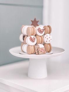 a white plate topped with lots of cookies