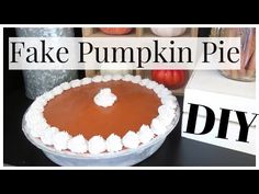 there is a cake with white frosting on it and the words fake pumpkin pie diy