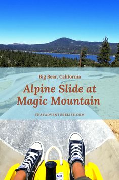 someone is sitting on an inflatable raft with the caption, alpine slide at magic mountain