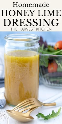 homemade honey lime dressing in a jar with a fork