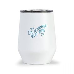 a white wine tumbler with the california fruit wine company on it's side