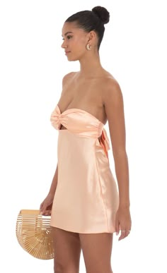 Satin Strapless Twist Cutout Dress in Peach | LUCY IN THE SKY Tight Mini Dress Party, Brunette Hoco Dresses, Preference Dresses Sorority, Hoco 2024 Dresses, Baby Pink Hoco Dress, Hoco Dresses Strapless, Hoco Dresses Satin, Pastel Hoco Dresses, Long Sleeve Semi Formal Dress