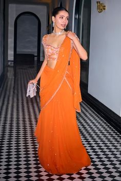 Orange pre-draped saree with glass bead, sequin, cutdana embroidery. Paired with front cut-out embroidered padded blouse. - Aza Fashions Pre Draped Saree Designs, Indian Woman Dress, Orange Saree With Black Blouse, Blouse Aesthetic Design, Orange Georgette Saree, Beaded Saree Blouse, Ghagra Saree Drape, Orange Saree Blouse Combination, Saree Outfit For Wedding