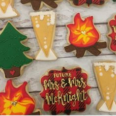 decorated cookies are displayed on a white wooden surface with the words, future mrs and mrs mcknight