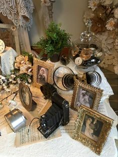 a table topped with pictures and other items