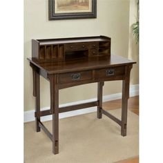 a wooden desk with two drawers and a drawer underneath it in a living room next to a wall