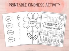 three printable kindness activities for kids to do with each other on a wooden surface