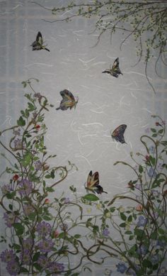 several butterflies are flying in the air above some flowers and vines on a white background